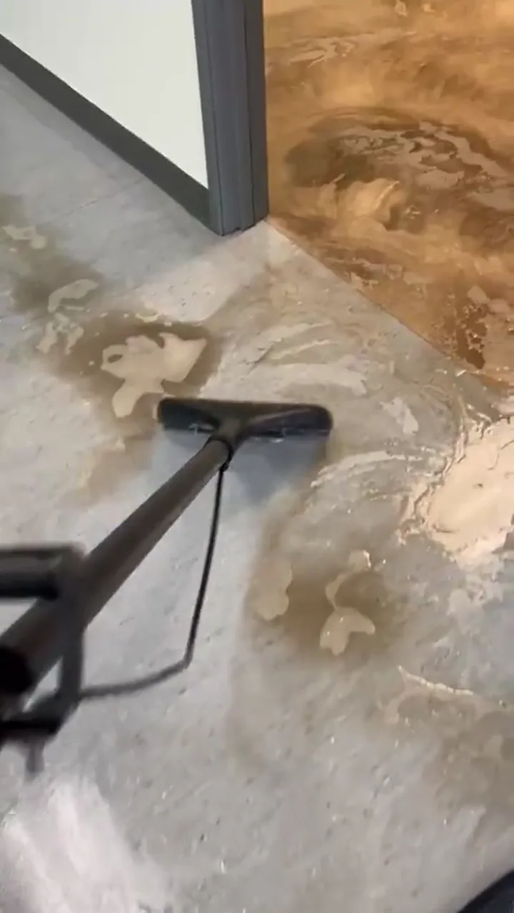 Video preview of heavily soiled commercial flooring being professionally cleaned
