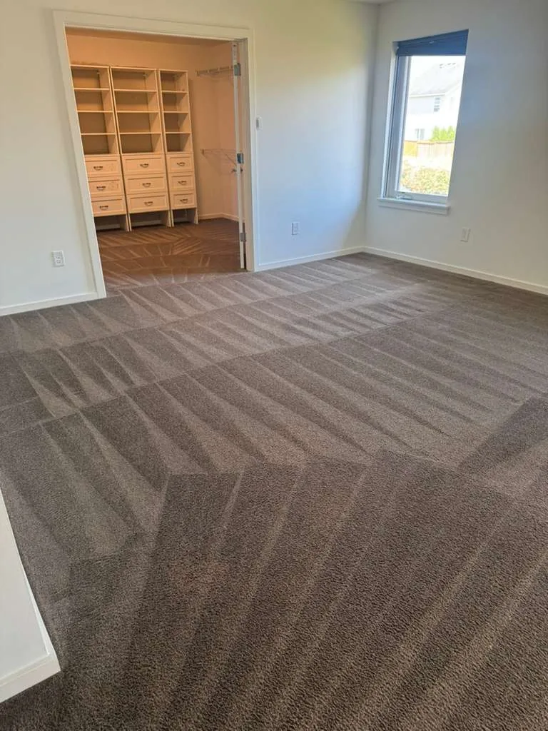 Clean commercial carpet in an empty room after service