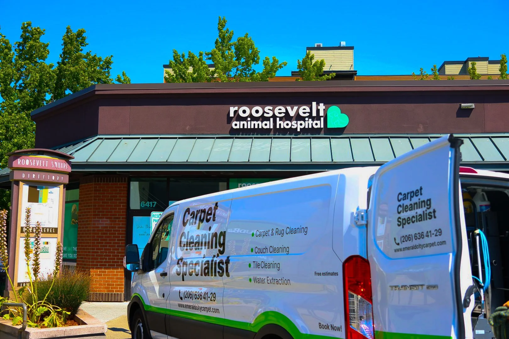 Emerald City Carpet Cleaning service van outside an animal hospital in Greater Seattle